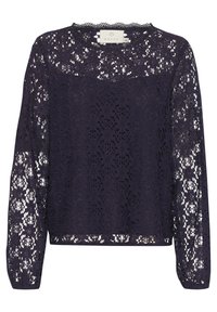 Haut en dentelle bleu marine à manches longues avec motif floral, encolure ronde et bords festonnés. Tissu léger avec une coupe ample et des sections transparentes.