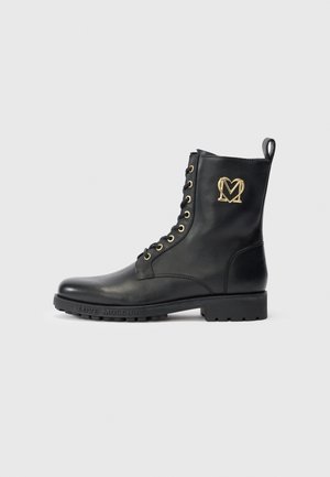 Bottines à lacets - black