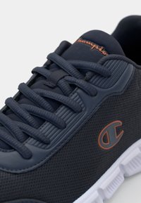 Champion JOLT - Training shoe - navy/koi