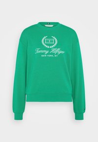 Felpa verde in cotone con collo rotondo, polsini e vita a costine. Presenta un logo ricamato bianco e un design a alloro sul davanti.