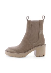 Beige suede ankle boots with elastic side panels, a chunky, textured block heel, and a rounded toe. Features pull tabs for easy wear.