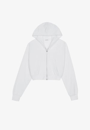 Witte cropped hoodie met een ritssluiting aan de voorkant, lange mouwen, zijzakken en een capuchon. Gemaakt van zachte stof met een gladde textuur.