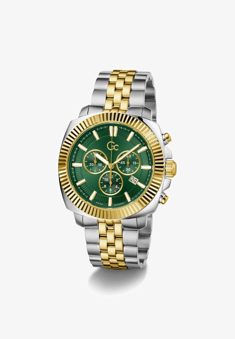 Vīriešu hronogrāfa pulkstenis ar zaļu ciparnīcu, zelta akcentiem, nerūsējošā tērauda un dzeltenā zelta ķēdi, kā arī datuma logu 6. pozīcijā.