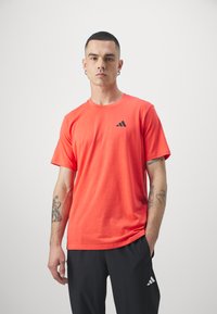 adidas Performance TR-ES FR T - Sportfelső - bright red/black