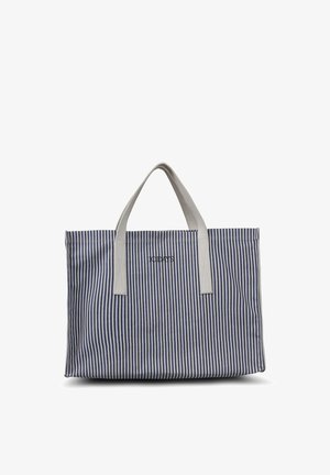 Sac fourre-tout rayé en tissu bleu et blanc avec des poignées grises, présentant une forme rectangulaire et un logo texte sur le devant.