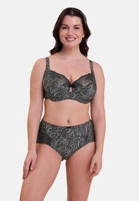 Soutien-gorge en dentelle noire avec une culotte taille haute assortie, présentant un motif floral, un détail en trou de serrure et des panneaux d'accent texturés.