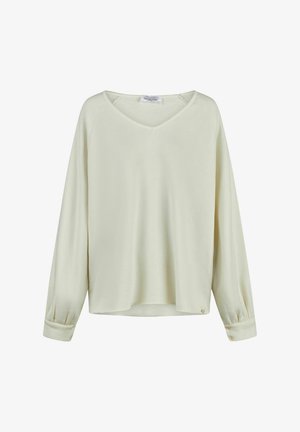 Helles Cremefarbenes Langarm-Oberteil mit V-Ausschnitt, Raglanärmeln und geknöpften Manschetten. Weicher Griff und lockere Passform, mit subtilen Branding-Details.