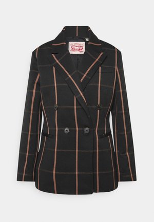 Blazer negro de doble botonadura con patrón de cuadros marrones, solapas con muesca y cuatro botones delanteros.