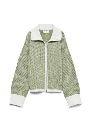 Veste zippée en tricot vert avec un col et des poignets blancs. Présente un tissage texturé et une coupe oversize pour un confort optimal.