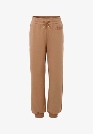 Pantaloni jogger in cotone marrone con vita elasticizzata, coulisse regolabile e dettaglio del logo in rilievo. Presentano caviglie elasticizzate per una vestibilità rilassata.