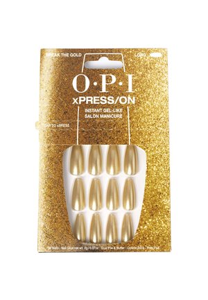 Des ongles press-on dorés avec une finition brillante, emballés dans une boîte dorée pailletée contenant 12 ongles allongés en forme d'amande.