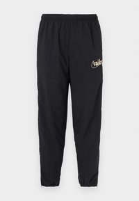 Μαύρο αθλητικό παντελόνι από ελαφρύ υλικό. Διαθέτει ελαστική μέση και τελειώματα με μανσέτες. Χρυσό λογότυπο στο μηρό.