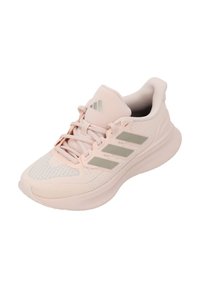 Ljusrosa träningssko med en texturerad ovandel, tre grå ränder på sidan och en dämpad sula för stöd. Mjuk snörningssystem.