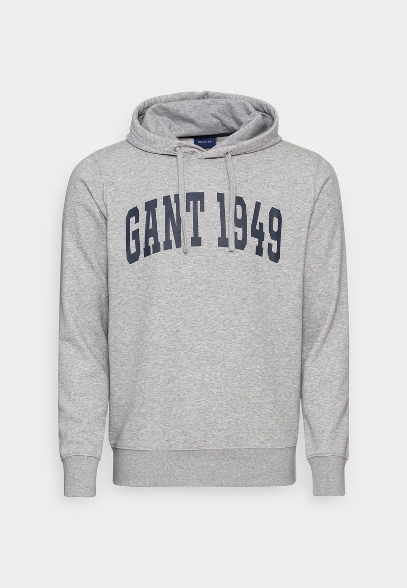 Sweat à capuche gris clair avec texte bleu marine "GANT 1949" sur la poitrine et cordons à la capuche.