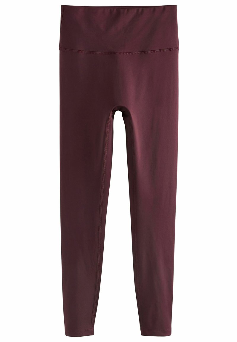 Vinröda leggings i ett mjukt, stretchigt material. De har en bred, elastisk midja och är åtsittande utan synliga sömmar.