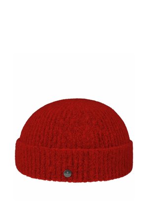Red knitted wool beanie with folded brim and small round silver brand tag on front center.