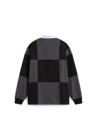 Långärmad skjorta med ett lapptäcke-mönster i varierande nyanser av svart och grått. Krage med ribbade ärmslut för bra passform. Tillverkad av bomull.