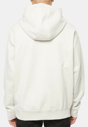 Lichtgrijze hoodie met een relaxte pasvorm, verstelbare trekkoorden, ribgebreide manchetten en een effen achterkant. Gemaakt van een zachte katoenmix.