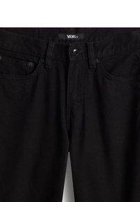 Black denim jeans with a straight fit, featuring a zip fly, classic five-pocket design, and subtle stitching details. Affixed Vans tag inside.