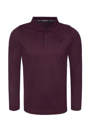 Långärmad polo i mörk burgundy, tillverkad av bomull, med krage, tre knappar och en subtil logotyp på bröstet.