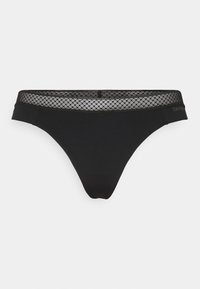 Black thong underwear with a mesh patterned waistband, made from soft fabric. Features a minimal design and a logo on the side.