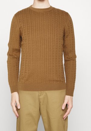 Braun gestrickter Pullover mit rundem Halsausschnitt und langen Ärmeln. Rippbündchen und Saum, aus weichem, strukturiertem Material gefertigt.