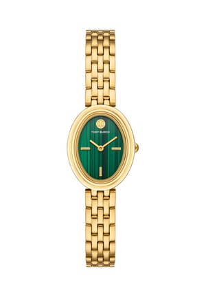 Gold bracelet watch with oval green malachite dial, minimal gold markers, and Tory Burch logo at 12 o'clock.