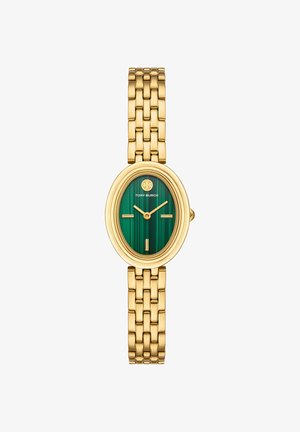 Gold bracelet watch with oval green malachite dial, minimal gold markers, and Tory Burch logo at 12 o'clock.