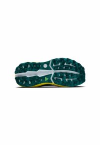 Suela de zapatilla para trail running en color azul verdoso y amarillo. Presenta tacos profundos para una mejor tracción, una entresuela blanca y goma texturizada para mayor durabilidad.