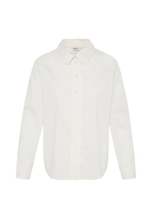 Chemise blanche à manches longues avec col pointu, boutons visibles sur le devant et ourlet légèrement arrondi.