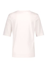 White short-sleeve t-shirt made of soft cotton. Features a crew neckline and a simple, unembellished design.