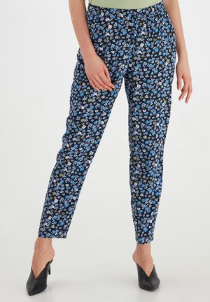 Hosen mit floralem Druck in Marineblau, mit einer Mischung aus blauen und weißen Blumen sowie grünen Akzenten, elastischem Bund und schlankem Schnitt.