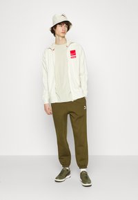 Puma Jogginghose - gruen