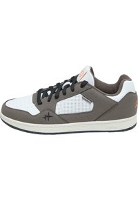 Brown and white sneaker with a perforated design, black laces, padded collar, and a rubber sole. Features a logo detail in orange.