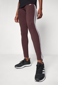 adidas Sportswear 3 STRIPES - Leggings - shadow brown