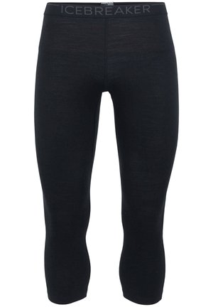 Svarta knälånga leggings i lätt material med en mjuk textur och en åtsittande design. Bandets logotyp i midjan.