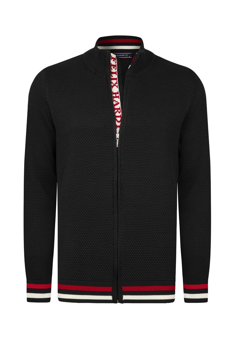 Cárdigan negro con cremallera hecho de material texturizado, con un cuello alzado y detalles a rayas en rojo, blanco y negro en los puños y el dobladillo.