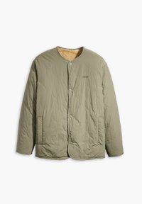 Quilted, olive-green jacket with a round collar, button closure, and soft beige lining. Features side pockets and subtle branding.