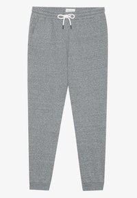 Grijze sweatpants van zacht materiaal, met een elastische tailleband met een koord en taps toelopende pijpen. Inclusief twee zijzakken.
