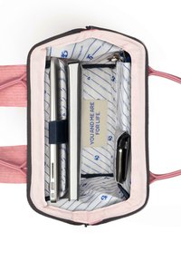 Pink and black laptop bag interior, featuring a striped lining. Contains a laptop, notebook, and wallet in organized compartments.