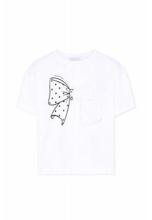 Biała koszulka z krótkim rękawem z dużą czarną kokardą w groszki oraz dopasowaną przymocowaną tkaninową kokardą na piersi, oznaczona marką Monnalisa.