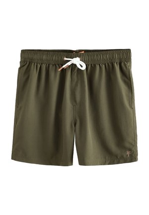 Olivgrüne Badeshorts mit elastischem Bund und weißem Kordelzug. Mit einem kleinen Palmbaumlogo am unteren linken Bein.