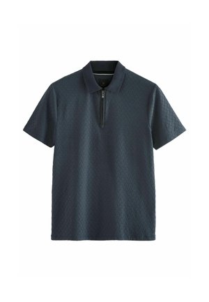 Polo gris foncé à manches courtes avec motif en diamant texturé et fermeture éclair à l'avant sous le col.