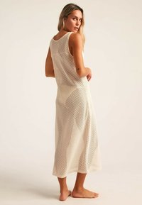 Robin Collection PAROS - Vestido de punto - ecru