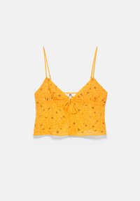 Haut court jaune sans manches avec fines bretelles, lien à l'avant, et broderie florale avec sequins sur fond clair.