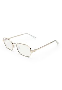 Γυαλιά με μεταλλικό χρυσό πλαίσιο, διαφανείς ορθογώνιους φακούς και ρυθμιζόμενα μαξιλαράκια μύτης, ακουμπώντας σε λευκή επιφάνεια.