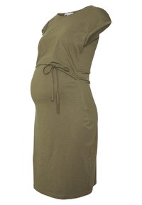 Vihreä oliivinvärinen äitiysmekko, joka on valmistettu pehmeästä puuvillasta. Mekossa on lyhyet käännetyt hihat, kerätty vyötärö säädettävällä nauhalla sekä istuva siluetti.