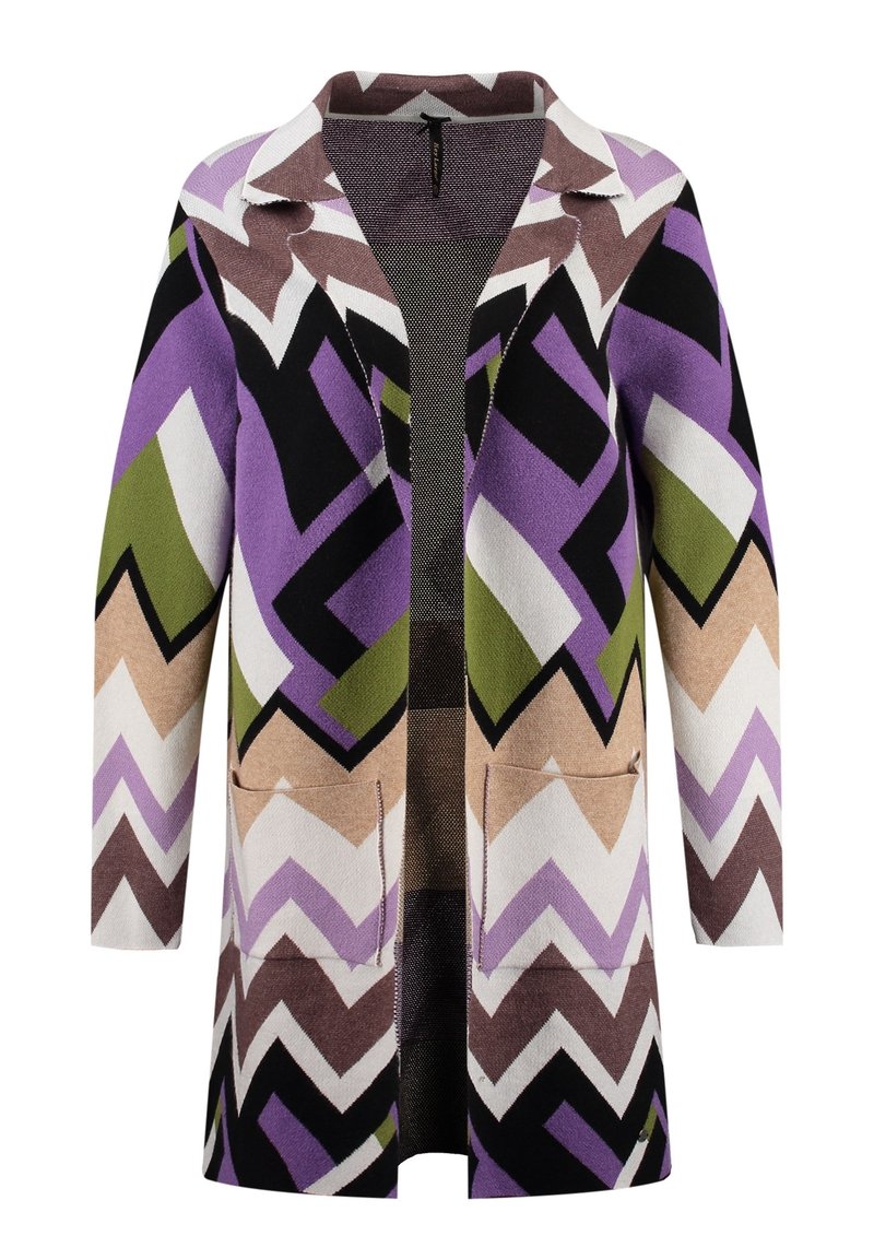 Lång cardigan i mjukt tyg med ett zigzag-mönster i lila, svart, brunt, grönt och beige. Har två framfickor.
