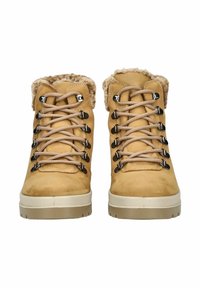 Brown suede ankle boots with faux fur lining, featuring beige laces and silver hardware. Thick, textured rubber soles for grip.