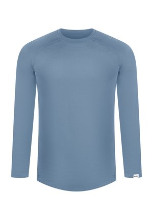 Langdurige sportshirt met lange mouwen in lichtblauw, gladde textuur, ronde hals, raglanmouwen en met zijsplitten voor meer bewegingsvrijheid.